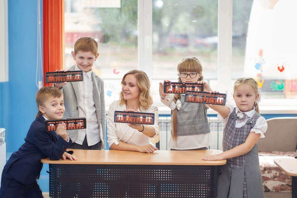 students of gem abacus classes showing happy faces